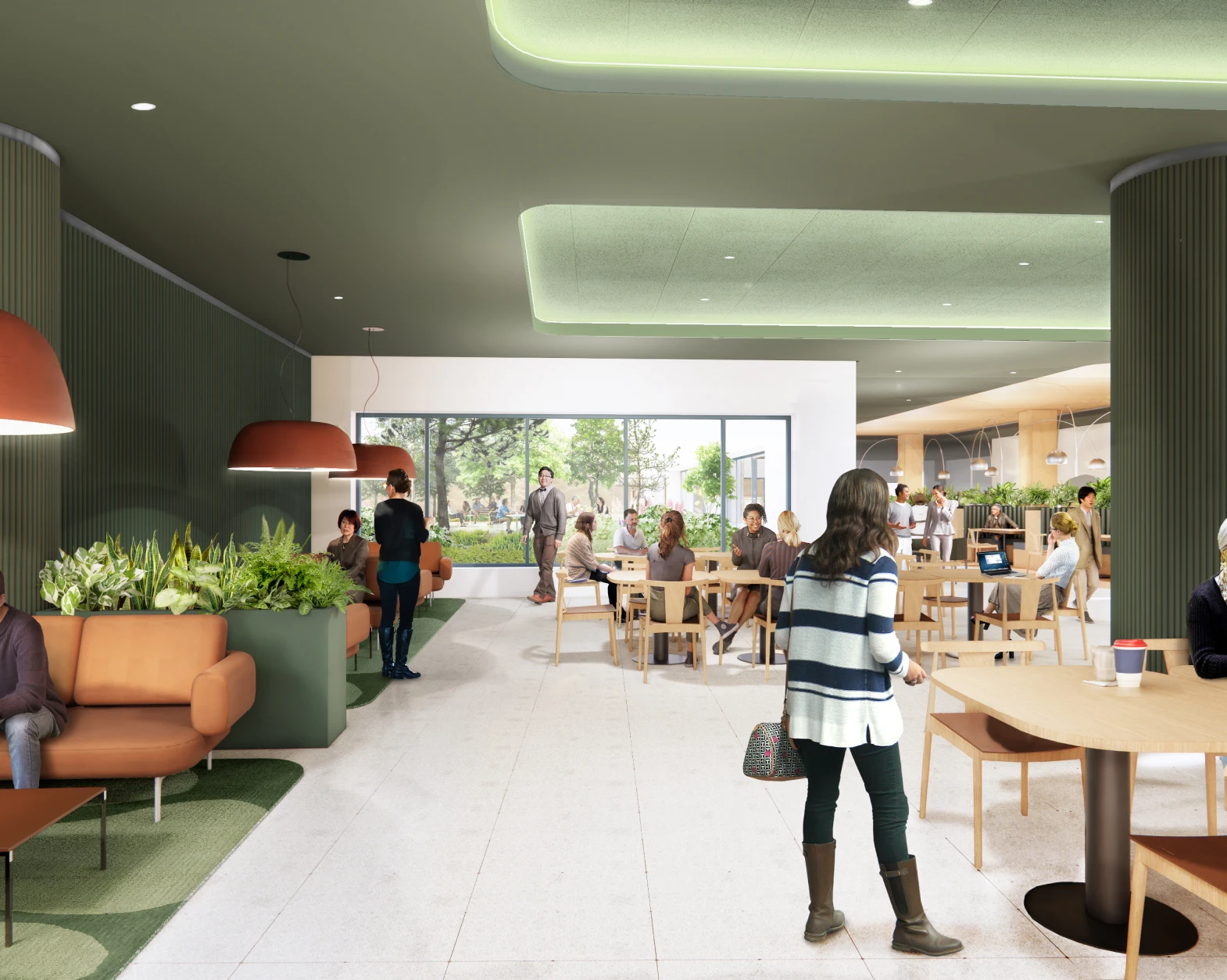 Casual dining area in office building with natural light, indoor plants, and collaborative vibe